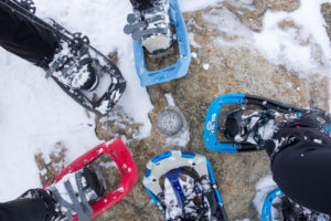 Hikers wear snowshoes for winter hiking.