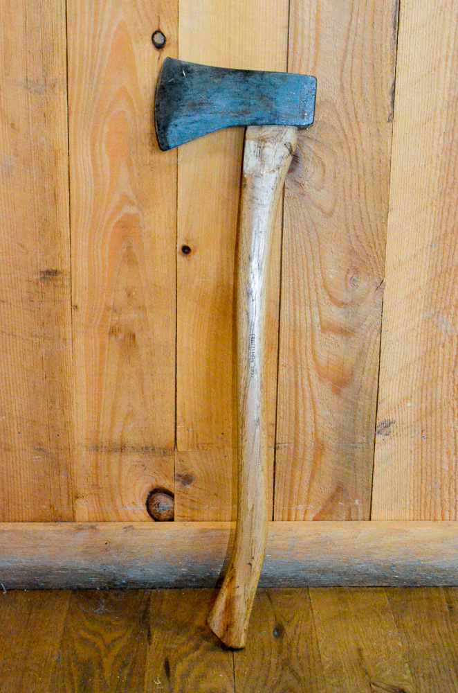 An axe is a common tool used in trail work