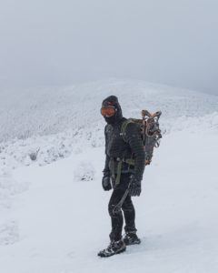 Hiker Matt Heller dresses in layers and packs appropriate traction footwear while hiking in winter.