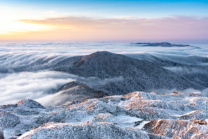 cloud later seen from a mountain summit at sunrise