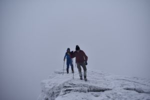 Hikers brace against winds on Mt Mansfield Ridge