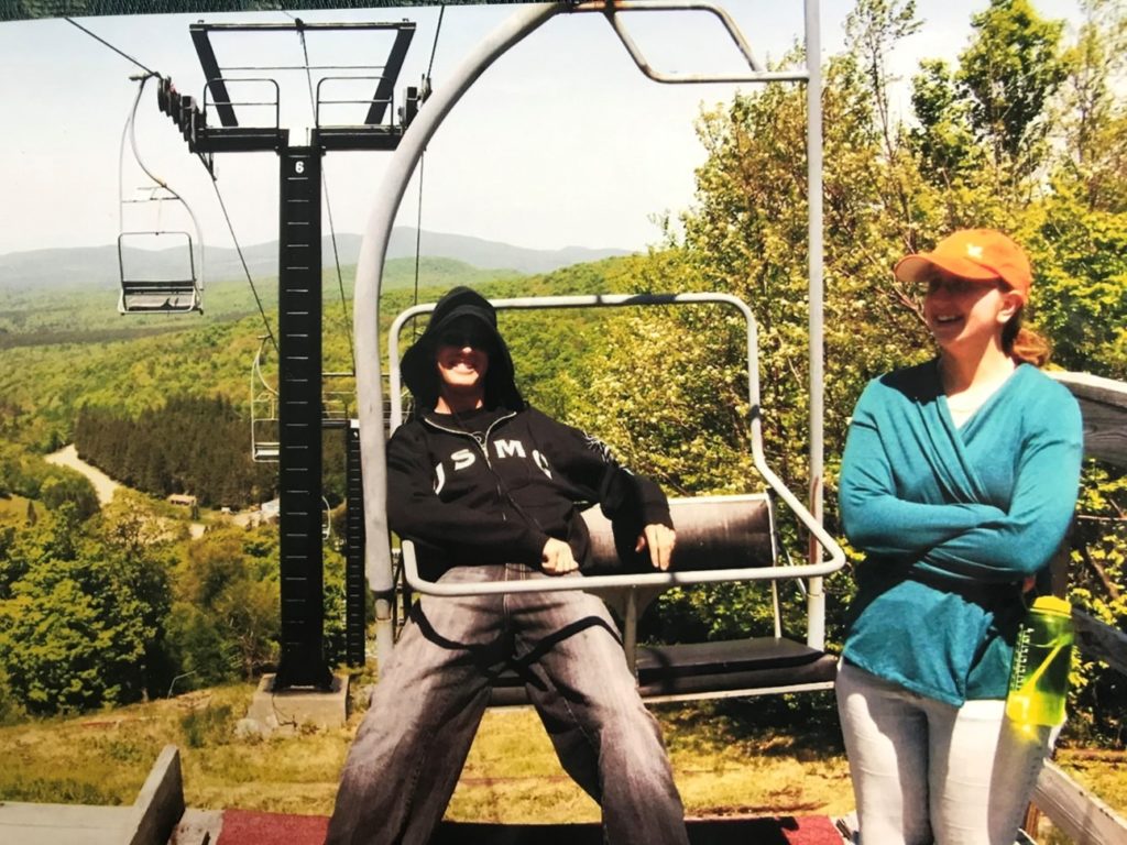 Karisa Dubuque and husband Derek on ski lift chair on Long Trail.