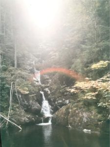 Rainbow over the waterfall.