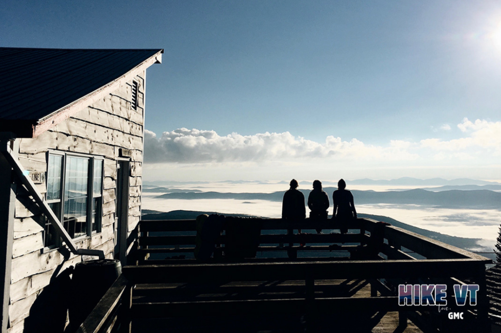 Hikers overlook view at Stark's Nest, an appropriate mud season alternative to Mt Ellen