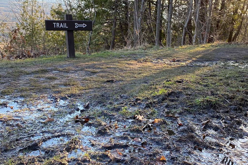 Mud by trail sign at Mt. Philo.