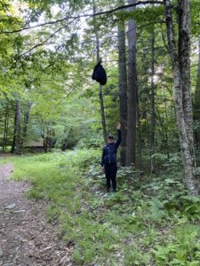Alicia demonstrates a bear hang