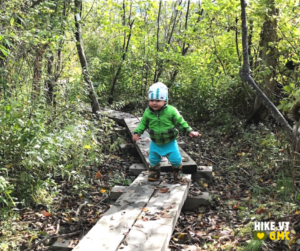 Quinn on puncheon on Short Trail, a great kid-friendly hike