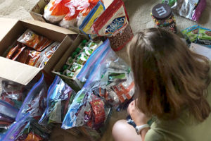 Organizing trail food for a thru-hike.