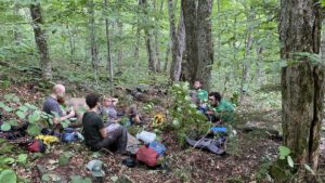 long trail patrol eats lunch on the trail