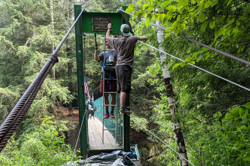 Staff repair Clarendon Gorge Bridge.