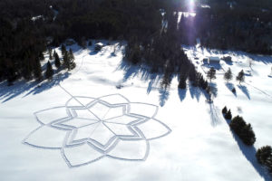 snowshoe art design is a combination of compass points and eighth circles