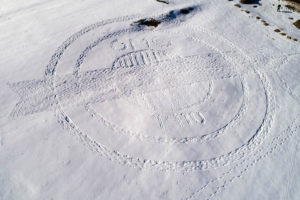 GMC logo in the snow, created by snowshoe
