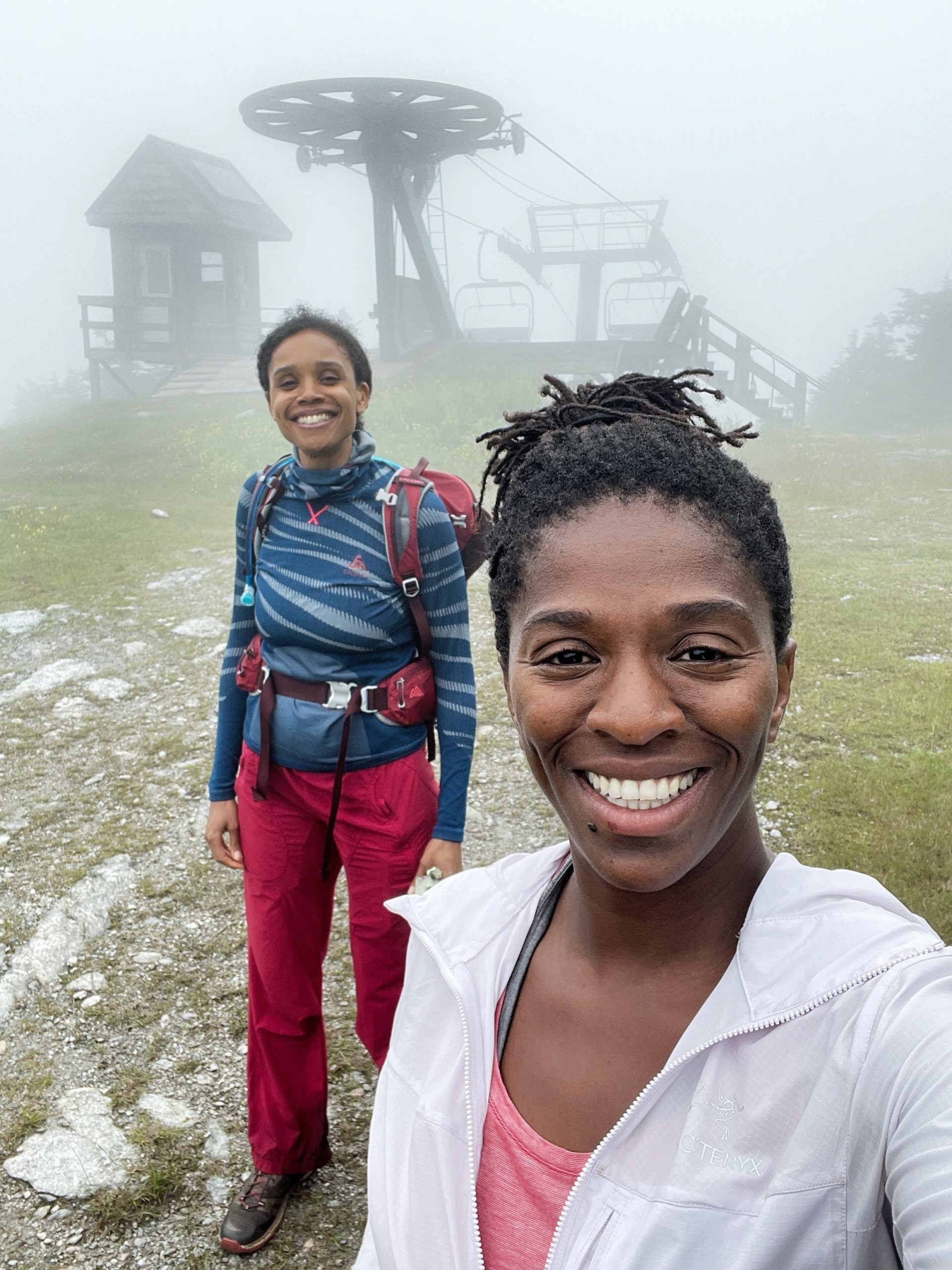 Mardi Fuller and another hiker pose for a selfie at the top of Mount Ellen in Vermont.