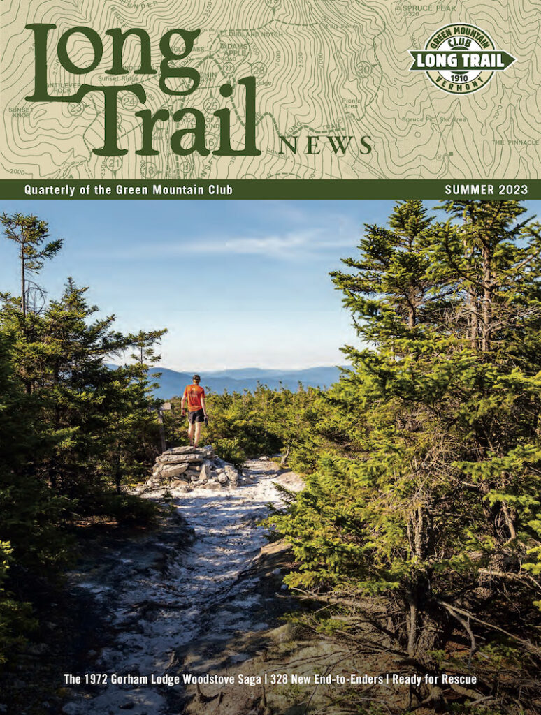 summer 2023 ltn cover - a hiker in orange faces away from the camera