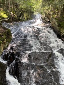 water cascades down a rocky waterfall on the Appalachian Trail