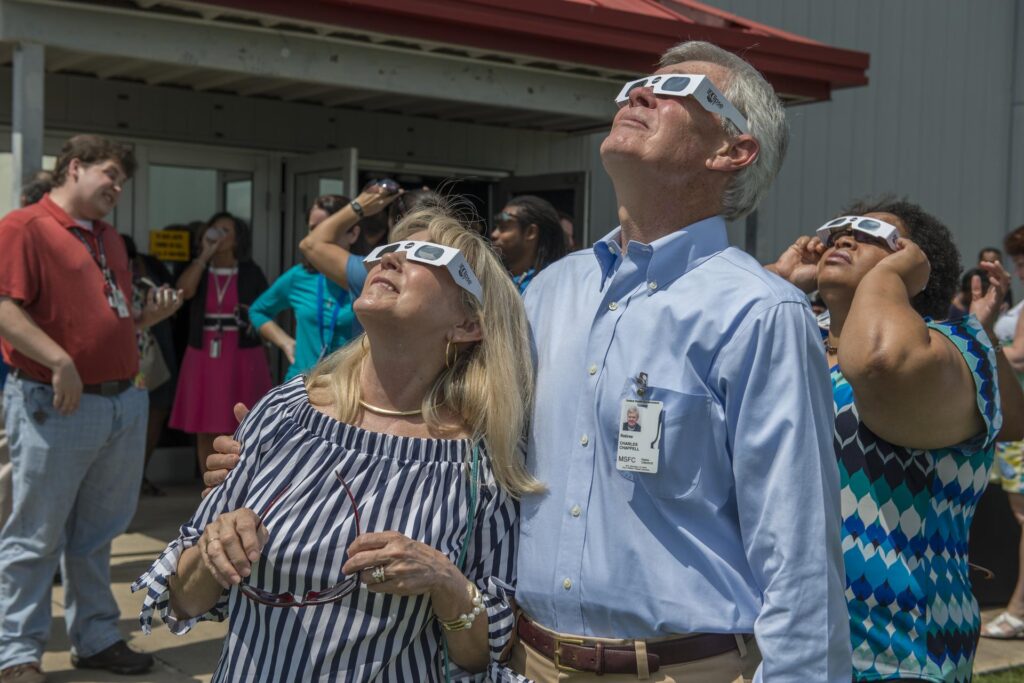 People watch the 2017 total solar eclipse with the safety of eclipse glasses.